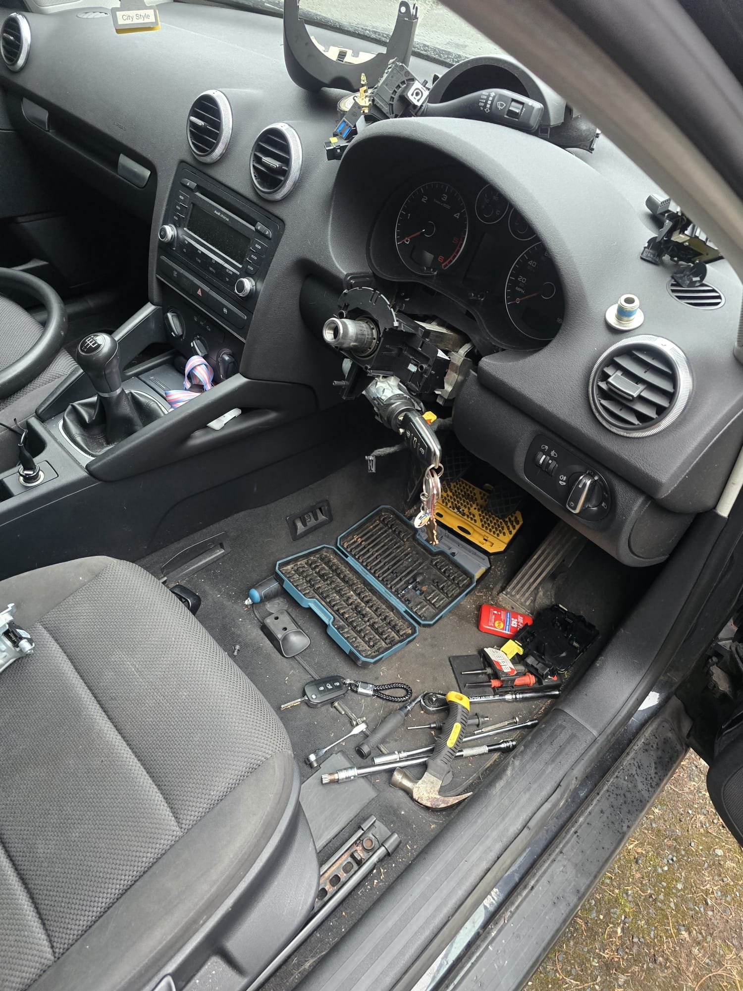 Professional auto locksmith attending vehicle in North Wales